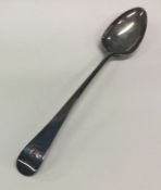 A Georgian silver basting spoon with crested termi