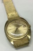 OMEGA: A good gent's 18 carat gold Automatic wrist