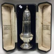 A good cased silver sugar caster. London 1905. By