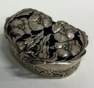 A good Edwardian silver pierced hinged box with ch