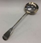 A large fiddle pattern silver soup ladle. London.