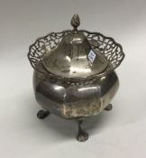 An Edwardian silver hinged top tea caddy with pier