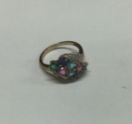 A 9 carat multi gem set ring. Approx. 4 grams. Est