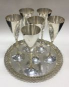 STUART DEVLIN: A set of six silver goblets on matching tray