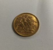 A 1958 full sovereign. Est. £300 - £350.