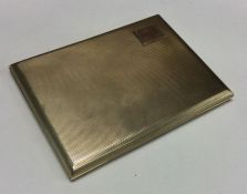 A heavy 9 carat engine turned cigarette case. Appro