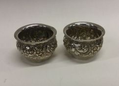 An attractive pair of salts decorated with flowers