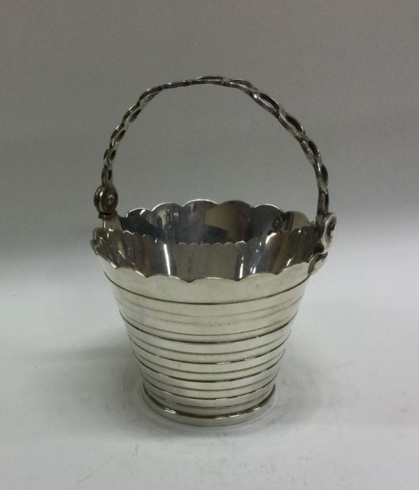 A Georgian style silver cream pail. Approx. grams.