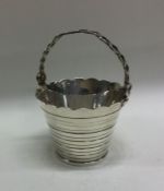 A Georgian style silver cream pail. Approx. grams.