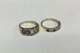 Two 9 carat gem set rings. Approx. 3 grams. Est. £