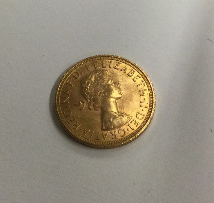A 1958 full sovereign. Est. £300 - £350. - Image 2 of 2