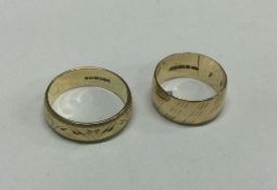 Two 9 carat wedding bands. Approx. 5 grams. Est. £