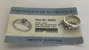 An amethyst ring set in silver. Approx. 2.85 grams