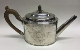 A good 18th Century George III silver teapot. Lond