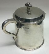 A rare silver biscuit box in the form of a tankard