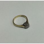 An 18 carat gold diamond mounted single stone ring