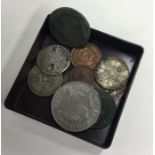 A quantity of coins. Est. £10 - £20.