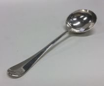 An OE and rat tail pattern silver sauce ladle. She