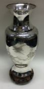An early 20th Century Chinese silver vase decorate