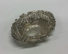 A heavy Edwardian silver two handled bonbon dish.