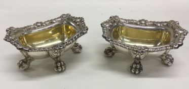 A fine pair of George III silver salts with gilt i