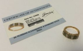An alexandrite and diamond ring set in 9 carat. Ap