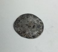 An old silver coin. Est. £10 - £20.