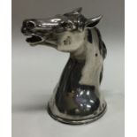 A rare silver stirrup cup in the form of a horse.