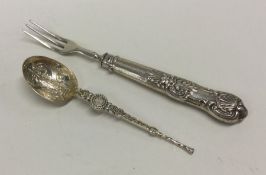 A cast silver anointing spoon together with a pick