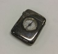 A good silver vesta case inset with a compass. Bir