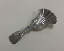 A bright cut silver caddy spoon. Birmingham 1830.
