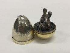 STUART DEVLIN: A silver 'surprise' egg cast with a