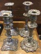 Two pairs of Old Sheffield plated candlesticks. Es