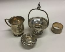 A small silver christening cup, napkin ring etc. V
