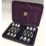 A cased set of twelve silver teaspoons together wi