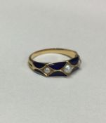 A gold and enamelled memorial ring with pearl deco