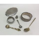 A heavy silver compact, napkin ring etc. Approx. 2