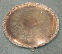 A massive silver plated circular salver with chase