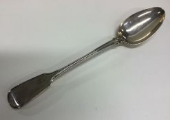 A fiddle and thread silver basting spoon. London 1