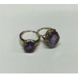 Two 9 carat amethyst mounted rings. Approx. 8 gram