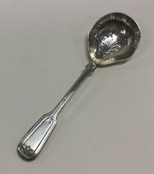 EXETER: A large bright cut silver caddy spoon. By