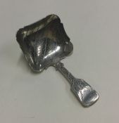 A bright cut silver caddy spoon. Birmingham circa