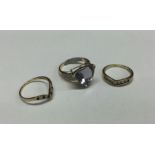 Three gold gem set rings. Approx. 8 grams. Est. £5