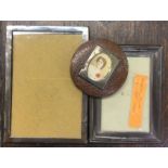 Three small silver picture frames together with a