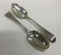 A pair of George II crested silver tablespoons. Lo