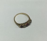 A good Victorian ruby and diamond five stone ring