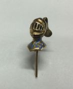 An Antique gold stick pin in the form of a knight'