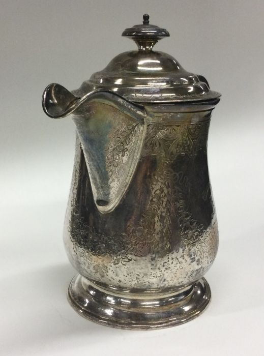 An Edwardian silver jug with engraved decoration. - Image 2 of 2
