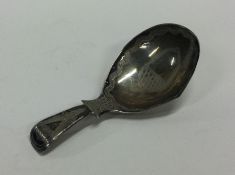 A good Georgian silver bright cut caddy spoon. Bir