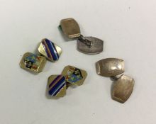 A pair of silver gilt cufflinks together with anot
